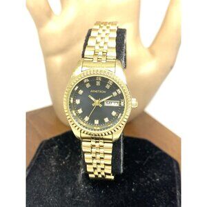 Armitron Womens Watch 75-5936GP Black Dial Day Date Quartz Gold Steel 25mm